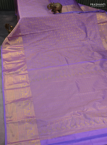 Kanchipuram silk saree lavender with allover zari woven brocade weaves and long rich zari woven border