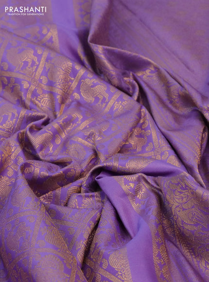 Kanchipuram silk saree lavender with allover zari woven brocade weaves and long rich zari woven border