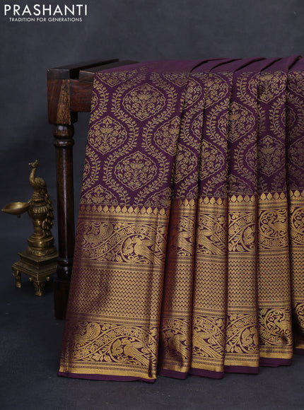 Kanchipuram silk saree wine shade with allover zari woven brocade weaves and long rich zari woven border