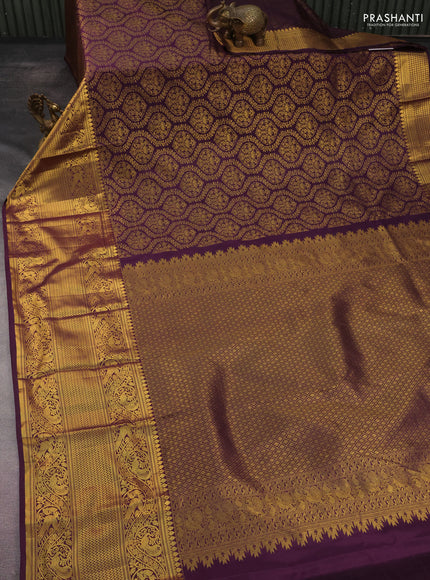 Kanchipuram silk saree wine shade with allover zari woven brocade weaves and long rich zari woven border
