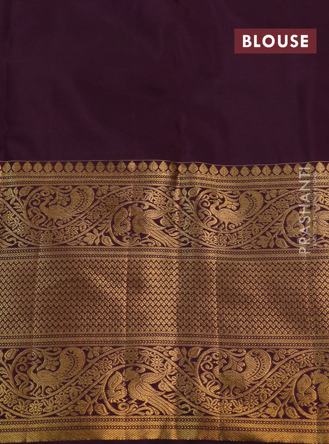 Kanchipuram silk saree wine shade with allover zari woven brocade weaves and long rich zari woven border