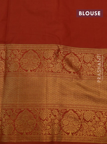 Kanchipuram silk saree lavender and rustic orange with allover zari woven brocade weaves and long rich zari woven border