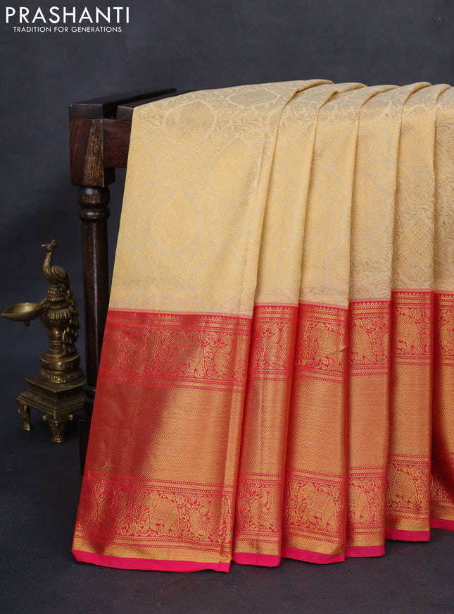 Kanchipuram silk saree cream and pink with allover zari woven brocade weaves and long rich zari woven border