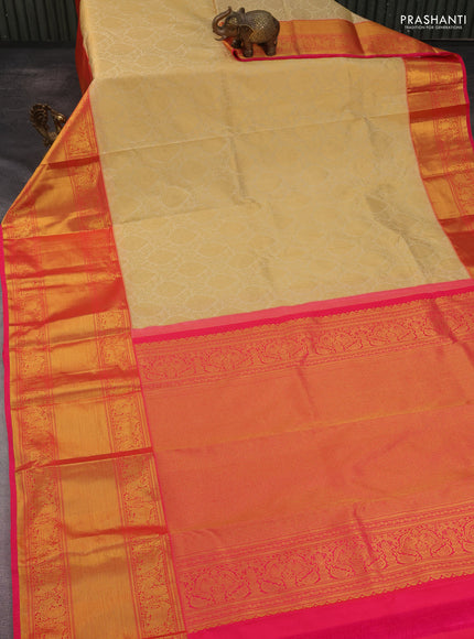 Kanchipuram silk saree cream and pink with allover zari woven brocade weaves and long rich zari woven border