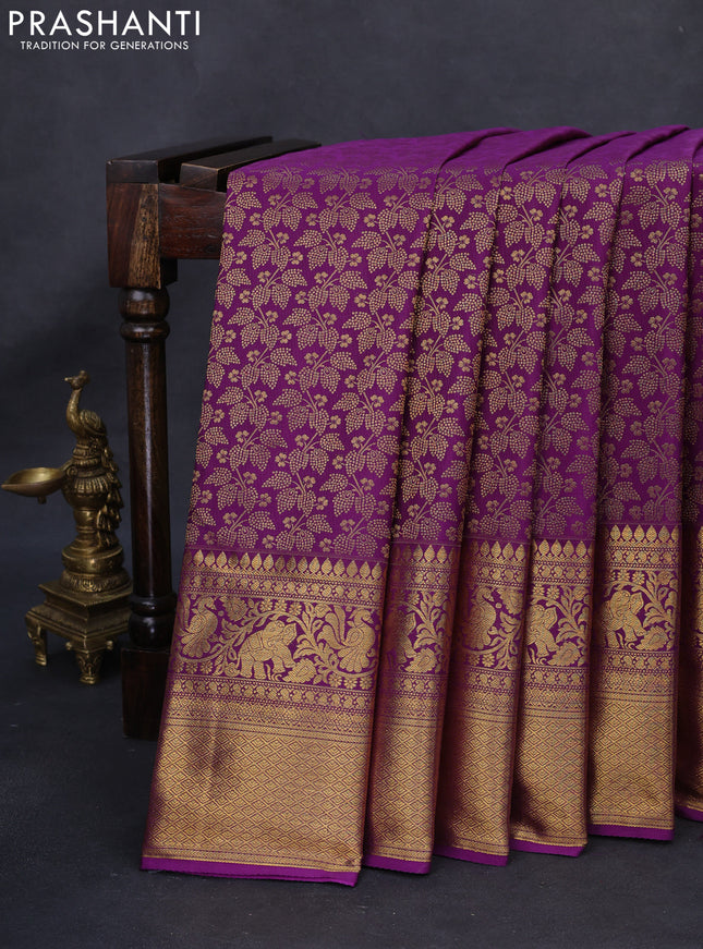 Kanchipuram silk saree purple with allover zari woven brocade weaves and long rich zari woven border