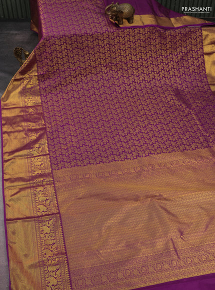 Kanchipuram silk saree purple with allover zari woven brocade weaves and long rich zari woven border