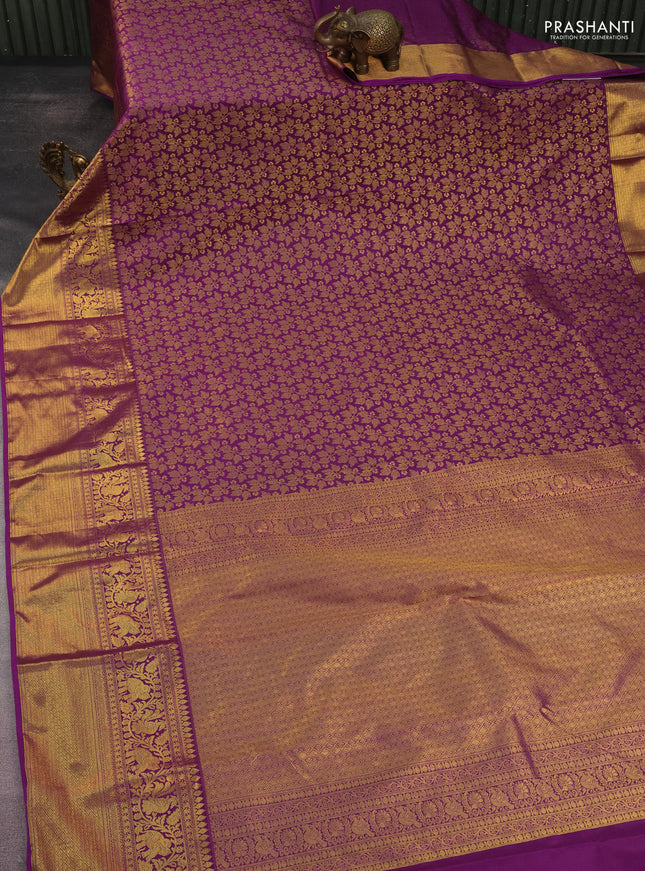 Kanchipuram silk saree purple with allover zari woven brocade weaves and long rich zari woven border