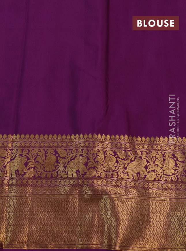 Kanchipuram silk saree purple with allover zari woven brocade weaves and long rich zari woven border
