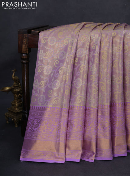 Kanchipuram tissue silk saree dual shade of lavender with allover zari woven brocade weaves and long rich zari woven border