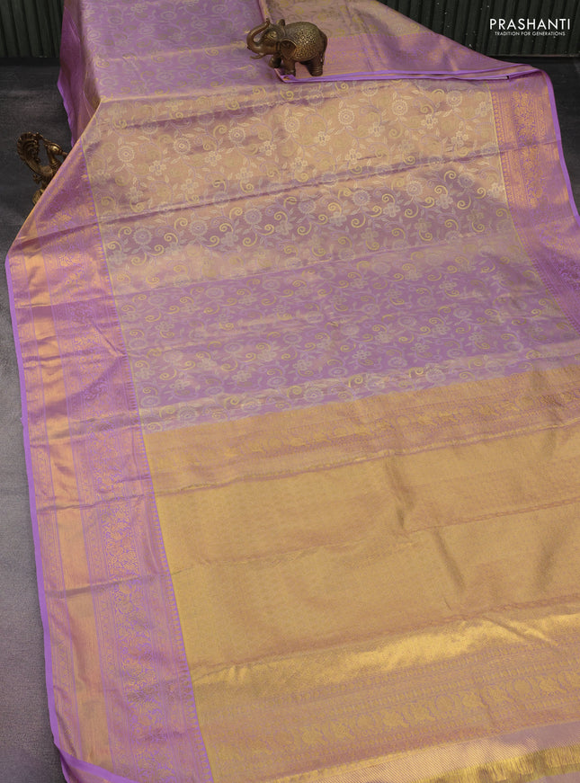 Kanchipuram tissue silk saree dual shade of lavender with allover zari woven brocade weaves and long rich zari woven border