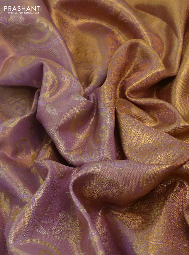 Kanchipuram tissue silk saree dual shade of lavender with allover zari woven brocade weaves and long rich zari woven border