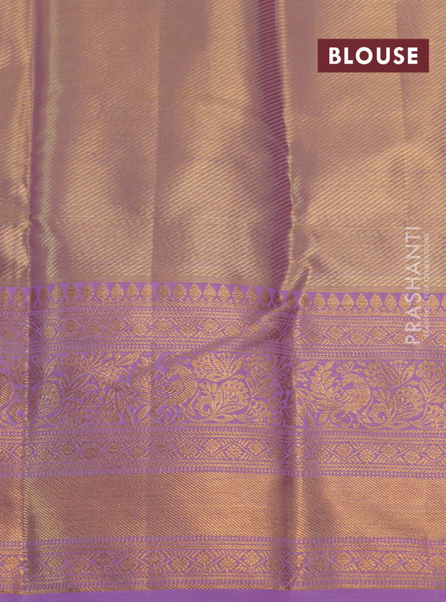 Kanchipuram tissue silk saree dual shade of lavender with allover zari woven brocade weaves and long rich zari woven border