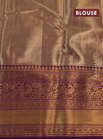 Kanchipuram tissue silk saree dual shade of golden purple and purple with allover zari woven brocade weaves and long rich zari woven border