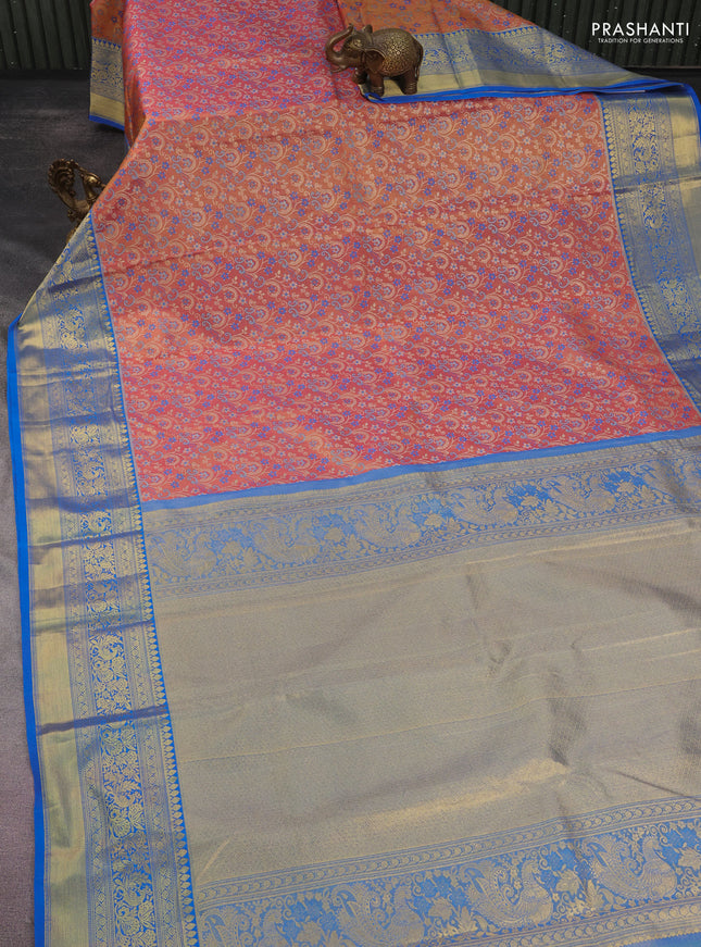 Kanchipuram tissue silk saree peach pink shade and cs blue with allover zari woven brocade weaves and long rich zari woven border