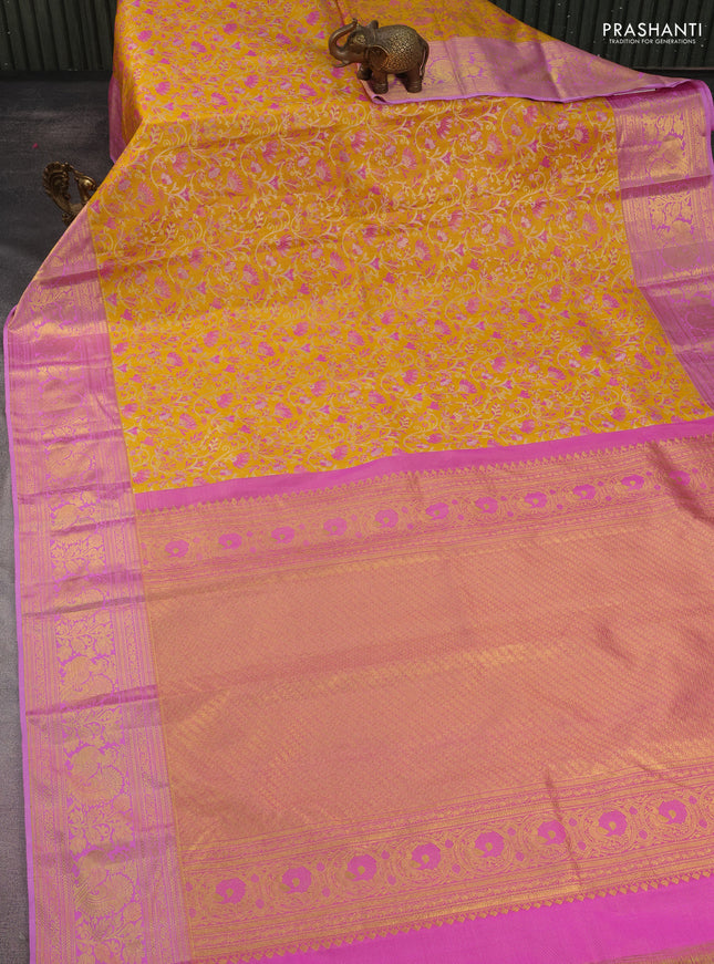 Kanchipuram tissue silk saree yellow and pink with allover zari woven brocade weaves and rich zari woven annam border