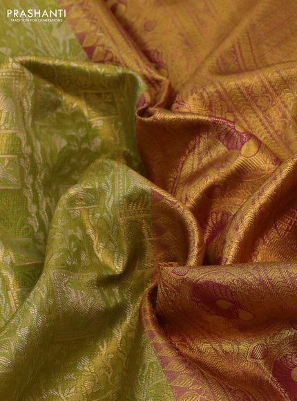 Kanchipuram tissue silk saree light green and purple with allover zari woven brocade weaves and rich zari woven border