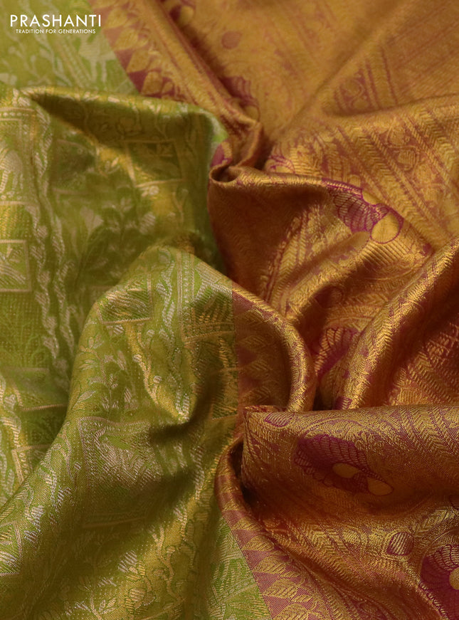 Kanchipuram tissue silk saree light green and purple with allover zari woven brocade weaves and rich zari woven border