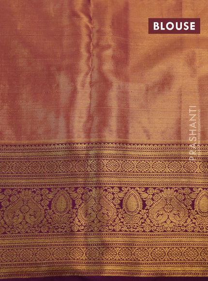 Kanchipuram tissue silk saree light green and purple with allover zari woven brocade weaves and rich zari woven border