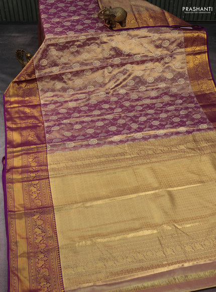 Kanchipuram tissue silk saree dual shade of purple with allover zari woven brocade weaves and long rich zari woven border
