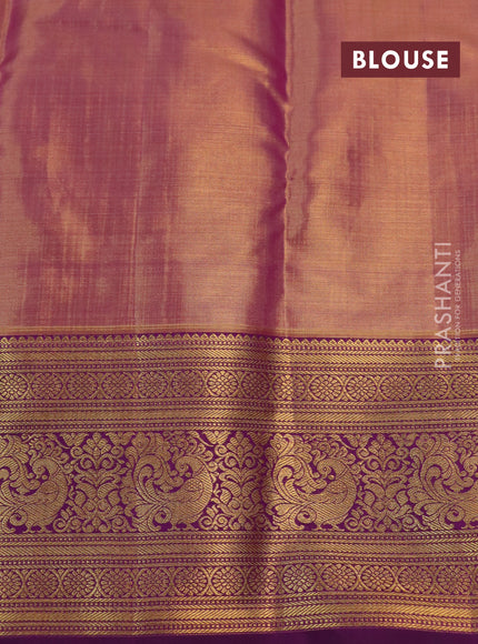 Kanchipuram tissue silk saree dual shade of teal blue and purple with allover zari woven brocade weaves and rich zari woven border