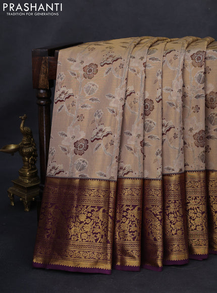 Kanchipuram tissue silk saree snadal and purple with allover zari woven floral brocade weaves and long rich zari woven border