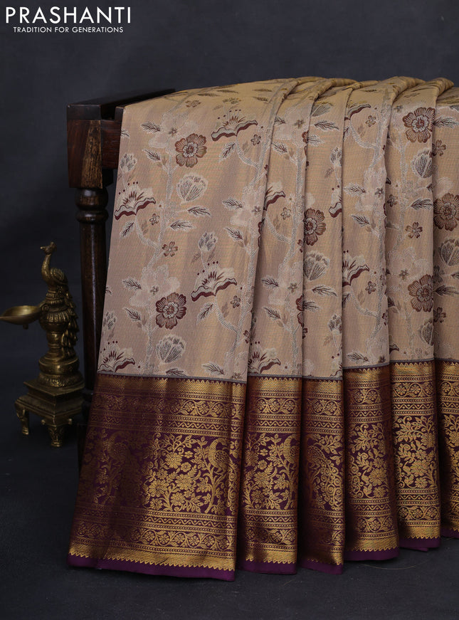 Kanchipuram tissue silk saree snadal and purple with allover zari woven floral brocade weaves and long rich zari woven border