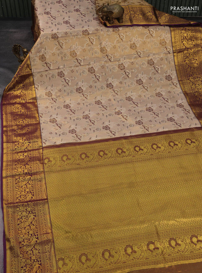 Kanchipuram tissue silk saree snadal and purple with allover zari woven floral brocade weaves and long rich zari woven border
