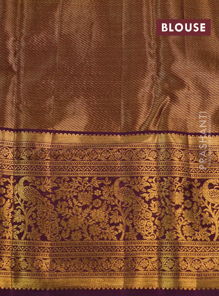 Kanchipuram tissue silk saree snadal and purple with allover zari woven floral brocade weaves and long rich zari woven border