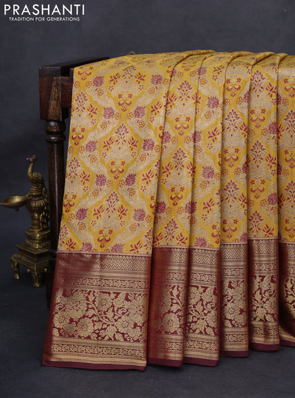 Kanchipuram tissue silk saree mustard yellow and maroon with allover zari woven brocade weaves and rich zari woven floral border