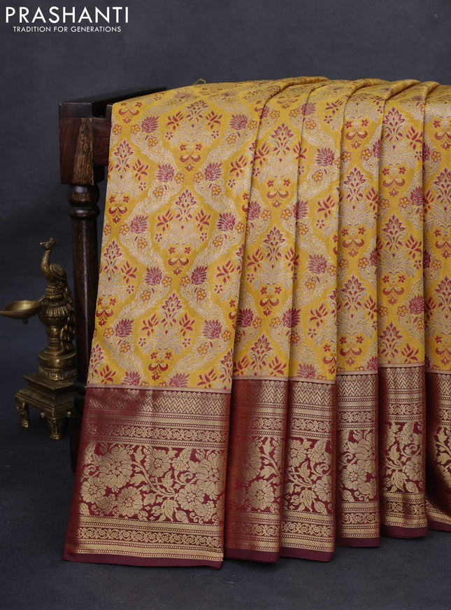 Kanchipuram tissue silk saree mustard yellow and maroon with allover zari woven brocade weaves and rich zari woven floral border