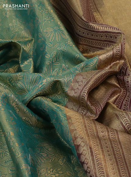 Kanchipuram tissue silk saree dual shade of teal green and maroon with allover floral zari woven brocade weaves and long rich zari woven border
