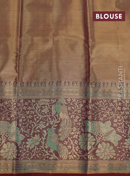 Kanchipuram tissue silk saree dual shade of teal green and maroon with allover floral zari woven brocade weaves and long rich zari woven border