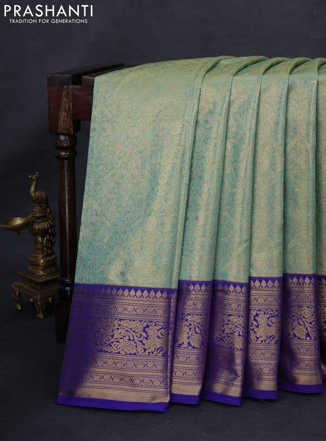Kanchipuram tissue silk saree dual shade of teal blue and blue with allover zari woven brocade weaves and rich zari woven border