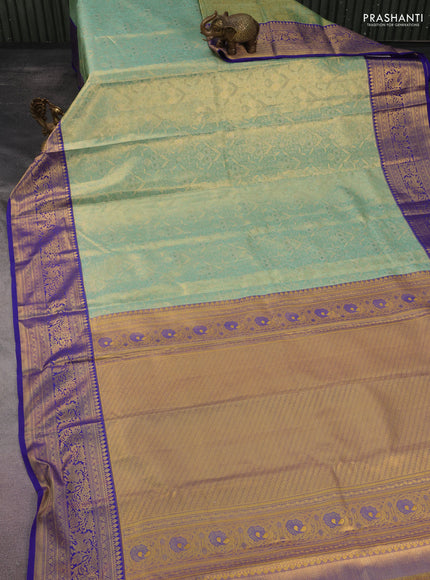 Kanchipuram tissue silk saree dual shade of teal blue and blue with allover zari woven brocade weaves and rich zari woven border