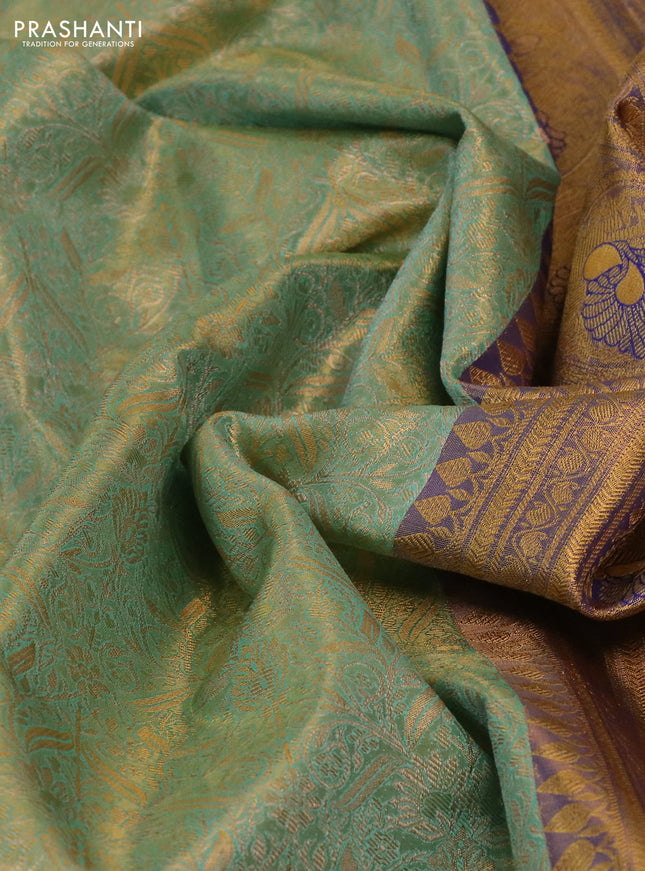 Kanchipuram tissue silk saree dual shade of teal blue and blue with allover zari woven brocade weaves and rich zari woven border