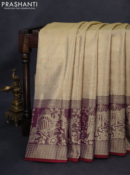 Kanchipuram tissue silk saree gold and maroon with allover zari woven brocade weaves and long rich zari woven border