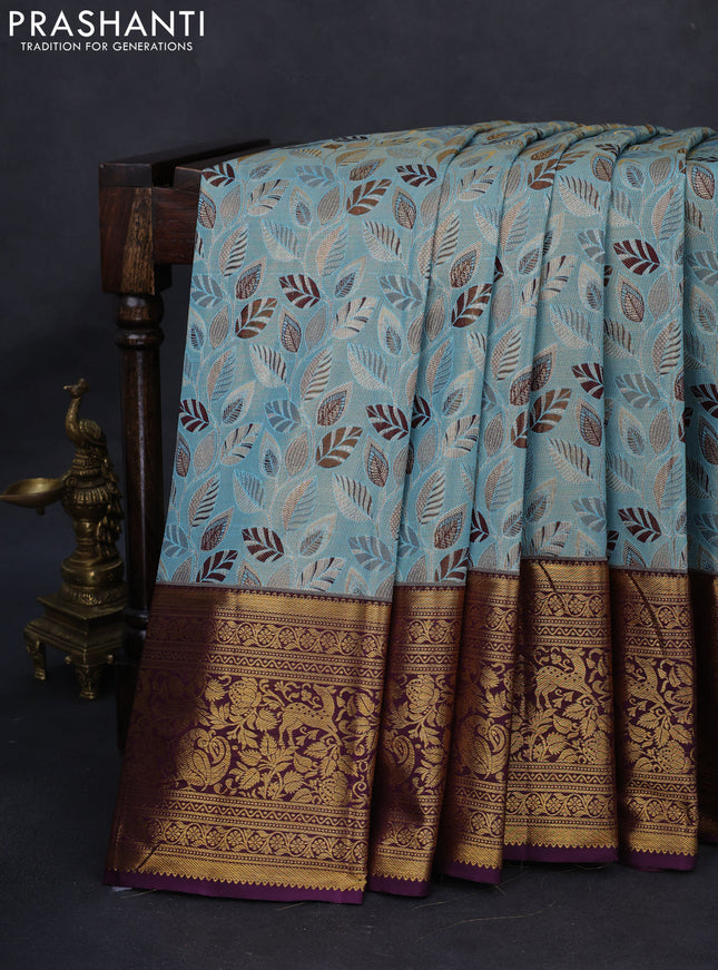 Kanchipuram tissue silk saree pastel blue and wine shade with allover zari woven leaf brocade weaves and long rich zari woven border