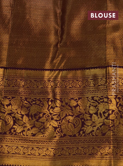 Kanchipuram tissue silk saree pastel blue and wine shade with allover zari woven leaf brocade weaves and long rich zari woven border