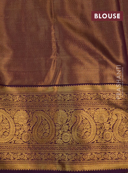 Kanchipuram tissue silk saree orange and purple with allover zari woven floral brocade weaves and long rich zari woven border