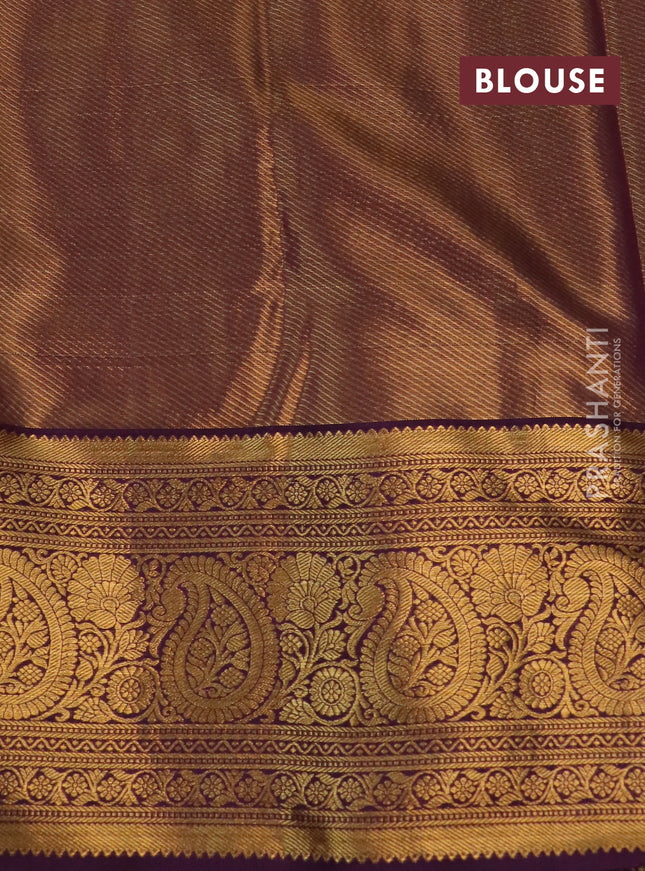 Kanchipuram tissue silk saree orange and purple with allover zari woven floral brocade weaves and long rich zari woven border