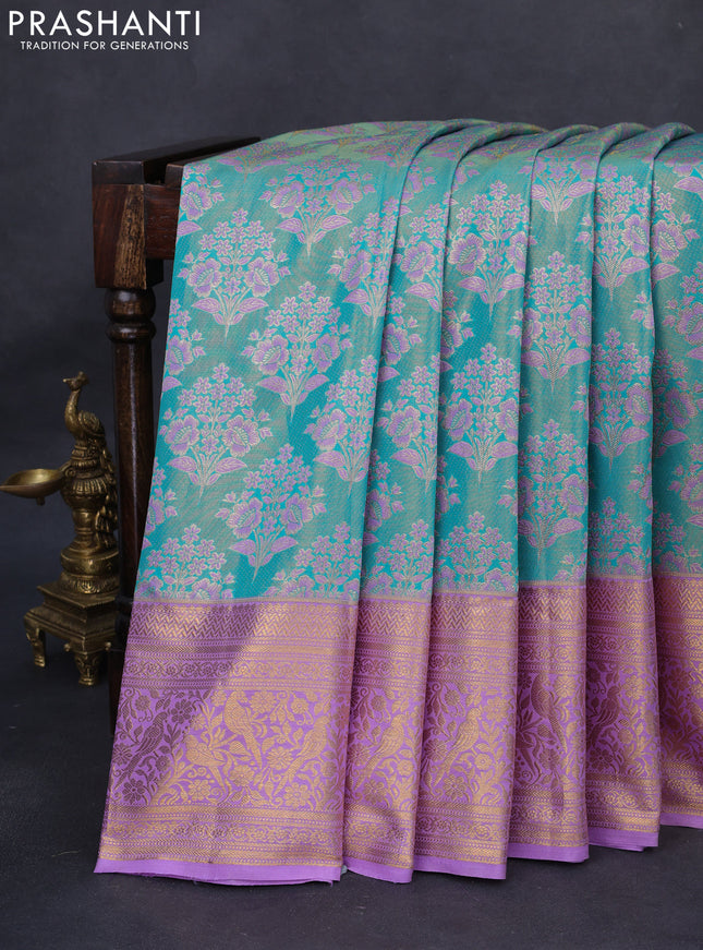 Kanchipuram tissue silk saree teal blue and lavender with allover zari woven floral brocade weaves and long rich zari woven border