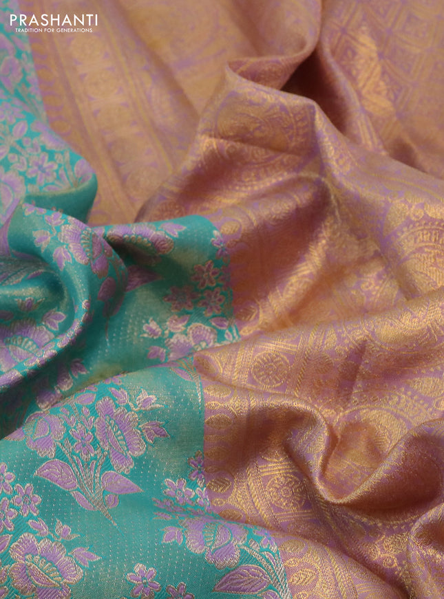 Kanchipuram tissue silk saree teal blue and lavender with allover zari woven floral brocade weaves and long rich zari woven border