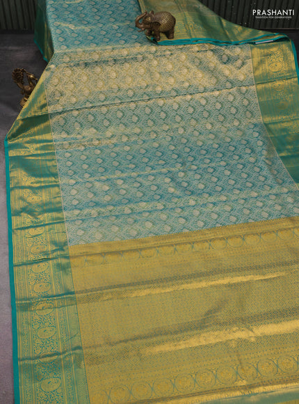 Kanchipuram tissue silk saree dual shade of teal green with allover zari woven brocade weaves and long rich zari woven border