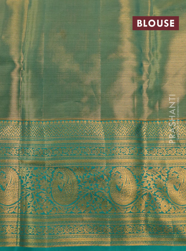 Kanchipuram tissue silk saree dual shade of teal green with allover zari woven brocade weaves and long rich zari woven border