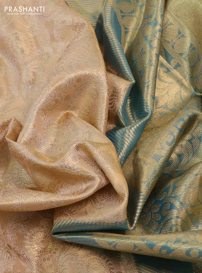 Kanchipuram tissue silk saree gold and cs blue with allover zari woven brocade weaves and long rich zari woven border