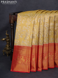 Kanchipuram tissue silk saree gold and red with allover zari woven brocade weaves and long rich zari woven border