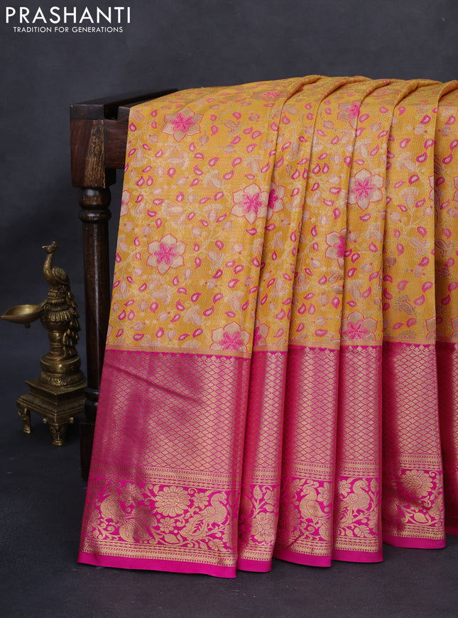 Kanchipuram tissue silk saree yellow and pink with allover zari woven brocade weaves and long rich zari woven border