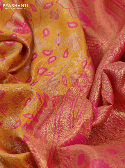 Kanchipuram tissue silk saree yellow and pink with allover zari woven brocade weaves and long rich zari woven border