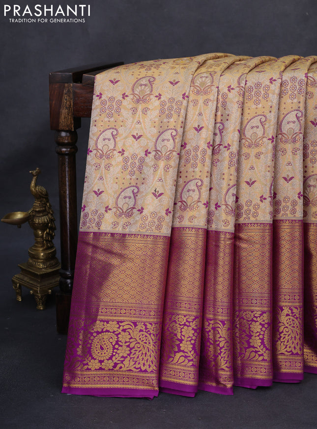 Kanchipuram tissue silk saree gold and purple with allover zari woven brocade weaves and long rich zari woven border