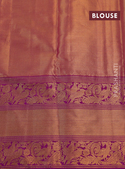 Kanchipuram tissue silk saree pista green and purple with allover zari woven floral brocade weaves and long rich peacock zari woven border